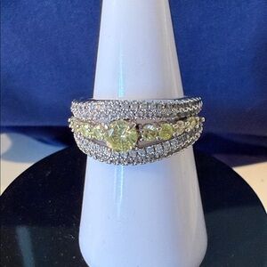 Elegant Silver and Yellow Gemstone Ring